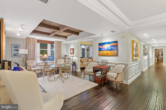 living room with crown molding, coffered ceiling, beamed ceiling, and dark hardwood / wood-style flooring