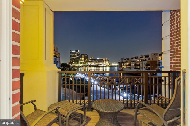 view of balcony at twilight