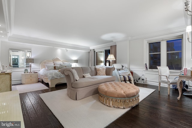 bedroom featuring crown molding and dark hardwood / wood-style flooring