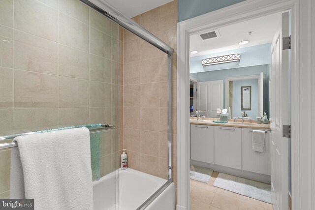 bathroom with vanity and tile patterned floors