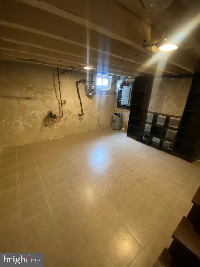 basement with tile patterned flooring