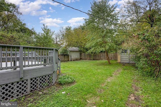 view of yard with a deck