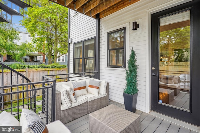 deck with an outdoor hangout area