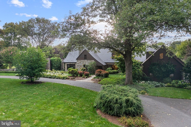 view of front of home with a front yard