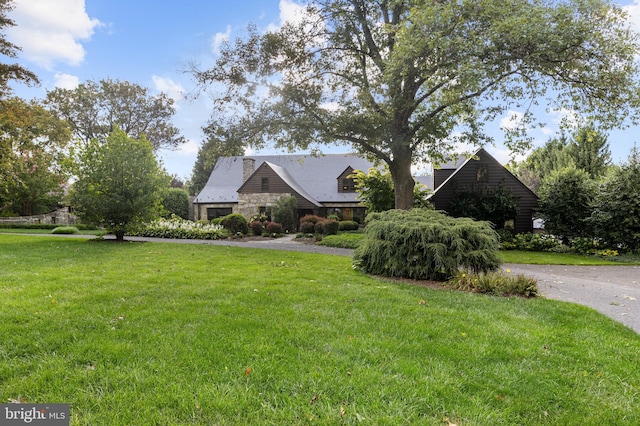 exterior space with a front lawn