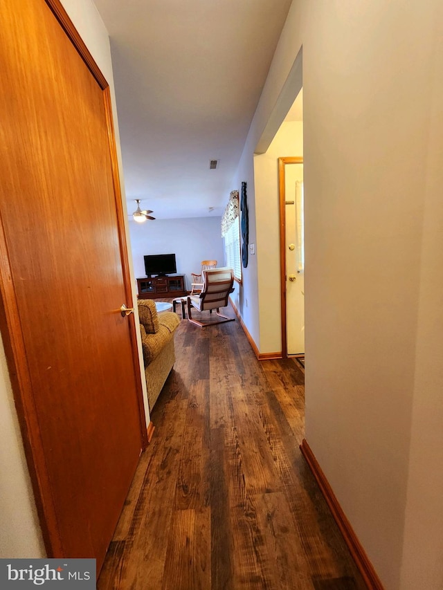 corridor featuring hardwood / wood-style flooring