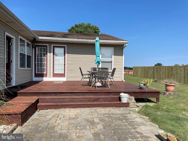 deck featuring a yard