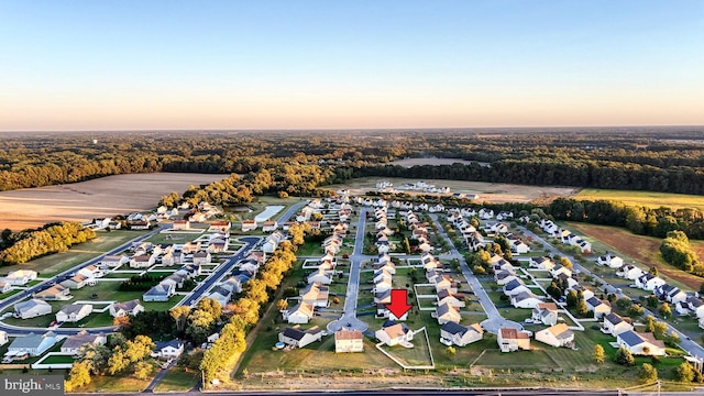 aerial view at dusk with a residential view