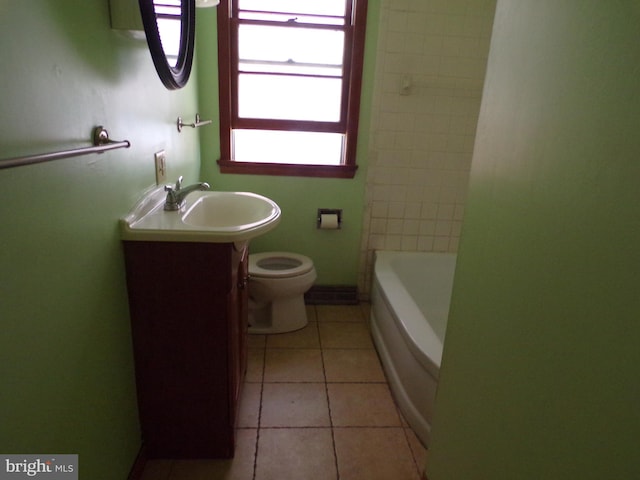 full bathroom featuring vanity, toilet, tile patterned floors, and separate shower and tub