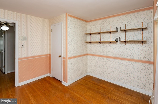 spare room featuring hardwood / wood-style floors