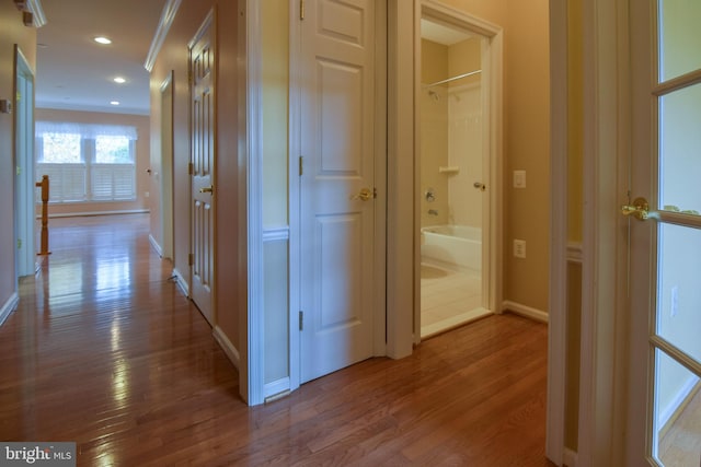 hallway featuring wood-type flooring