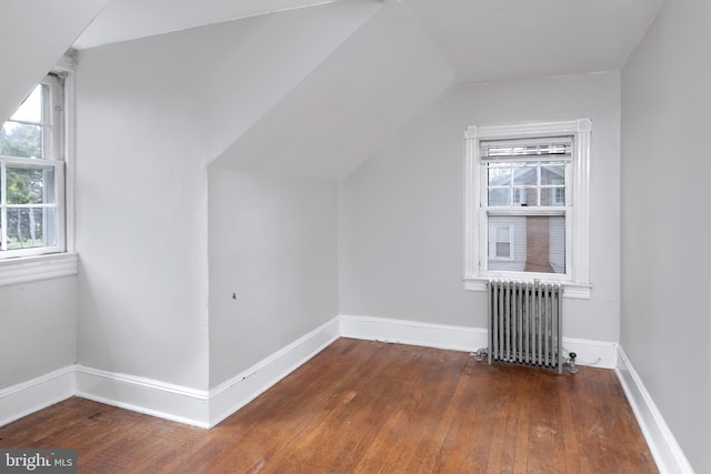2000 Lawrence Rd, Lawrence Township, NJ 08648 - additional living space featuring radiator, hardwood / wood-style floors, lofted ceiling, and baseboards