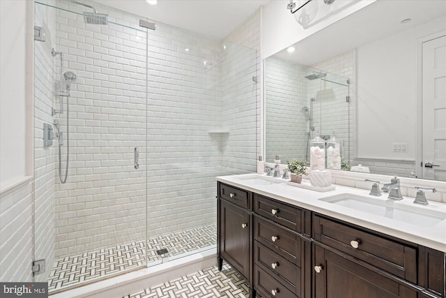 bathroom with vanity and an enclosed shower