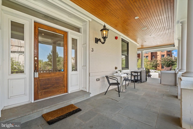 entrance to property with a porch