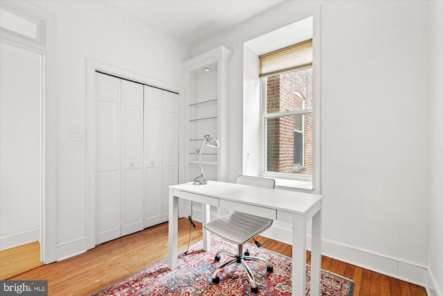 office space featuring hardwood / wood-style floors