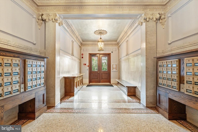 foyer featuring crown molding