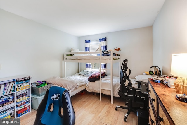 bedroom with light wood-type flooring