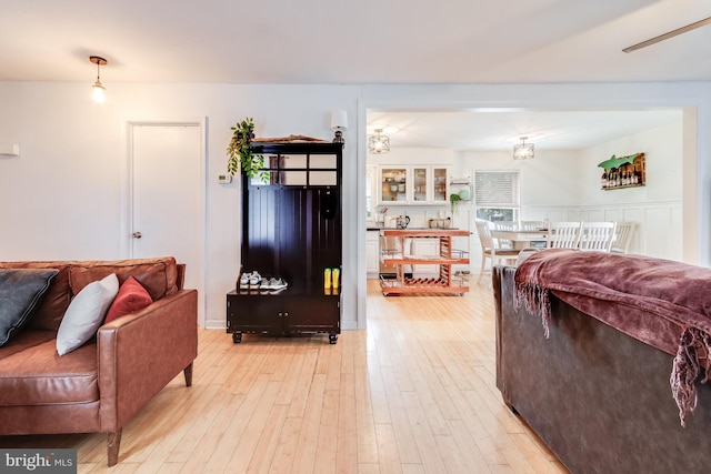 living room with light hardwood / wood-style floors