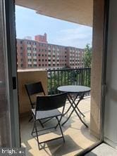 balcony featuring a view of city