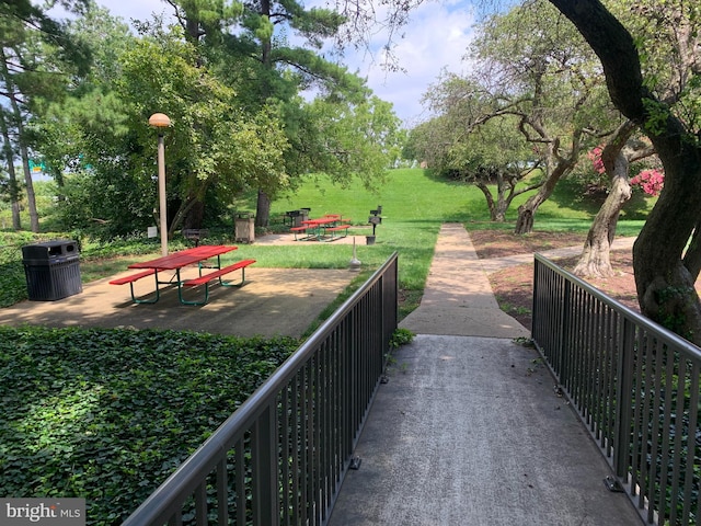 view of home's community featuring a yard