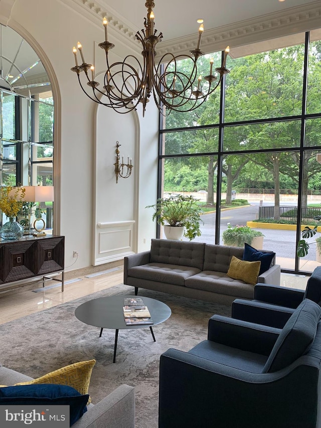 living room with a notable chandelier