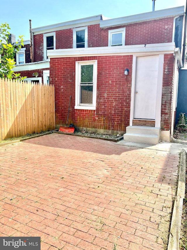 back of house featuring a patio