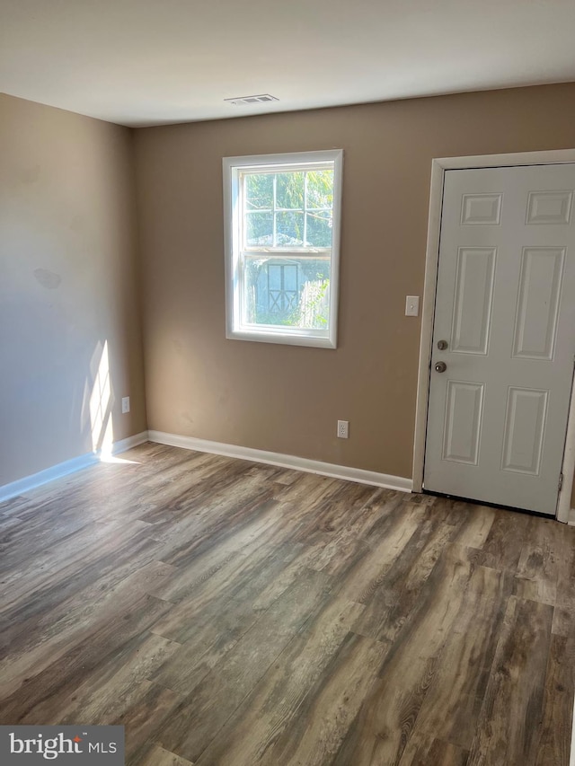 entrance foyer with hardwood / wood-style floors