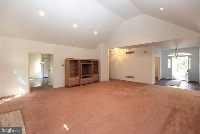 dining area featuring wood-type flooring, a notable chandelier, and crown molding