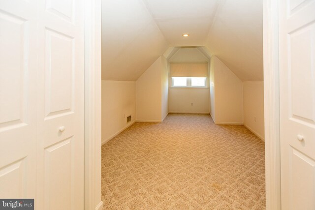 utility room with heating unit and water heater