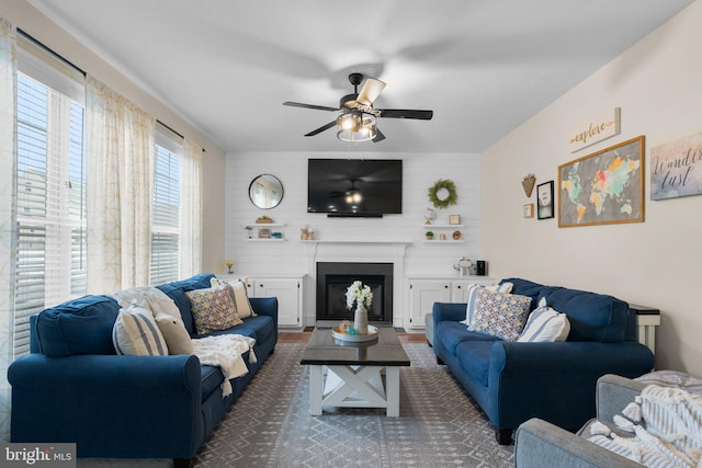 living room featuring ceiling fan