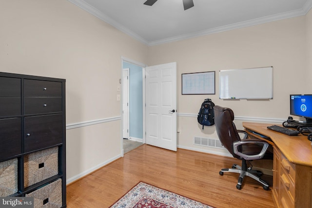 office space featuring ceiling fan, light hardwood / wood-style floors, and crown molding