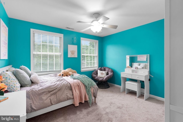 carpeted bedroom featuring ceiling fan