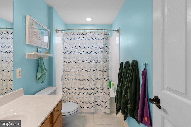 full bathroom with vanity, toilet, shower / tub combo with curtain, and tile patterned floors