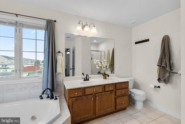 full bathroom with tile patterned flooring, vanity, toilet, and independent shower and bath