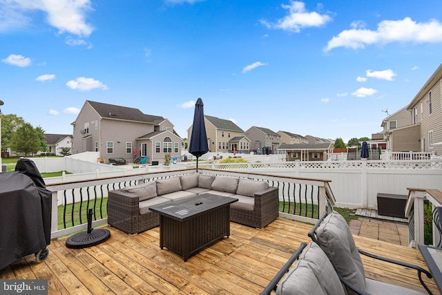 view of patio / terrace featuring area for grilling, an outdoor hangout area, and a deck