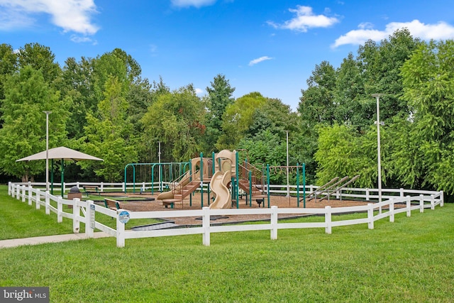 view of playground featuring a yard