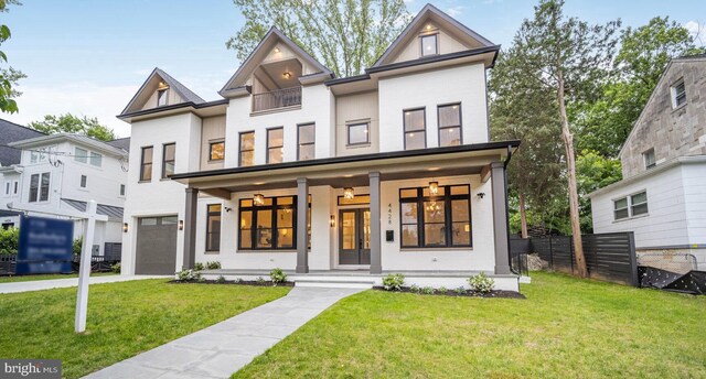 4428 Albemarle St NW, Washington, DC 20016 - view of front facade with an attached garage, a porch, and concrete driveway