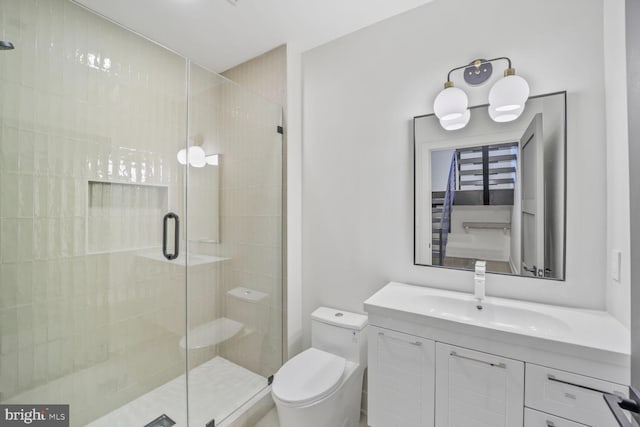 4428 Albemarle St NW, Washington, DC 20016 - bathroom with toilet, vanity, and a stall shower