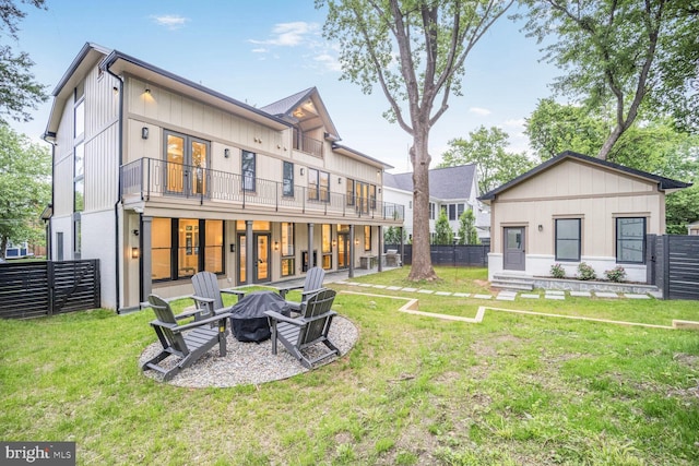 4428 Albemarle St NW, Washington, DC 20016 - rear view of property featuring an outdoor fire pit and a balcony
