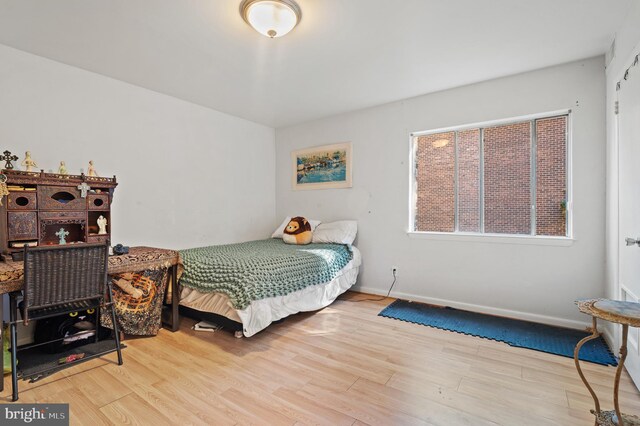 bedroom featuring hardwood / wood-style flooring