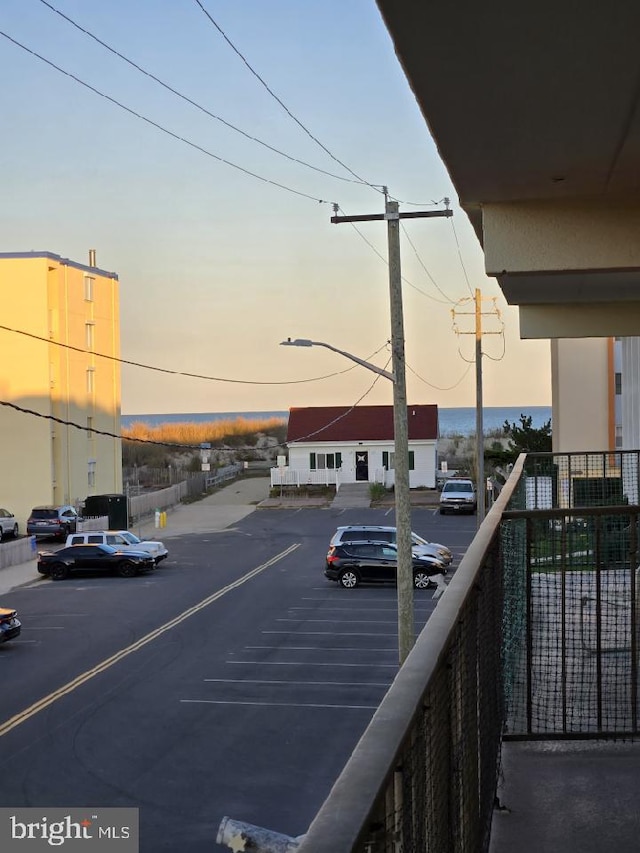 view of balcony at dusk