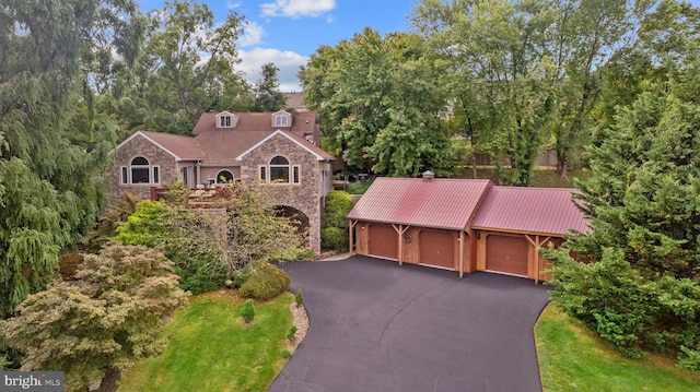 view of front of property with a garage