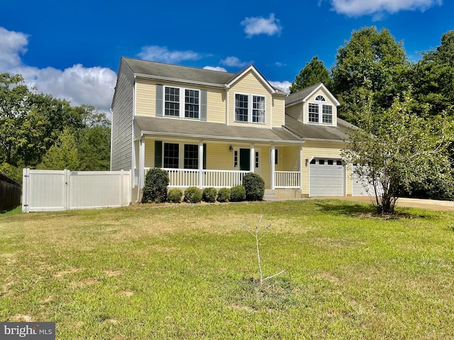 view of front facade featuring a front lawn and covered porch