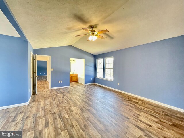 unfurnished bedroom with dark wood-type flooring