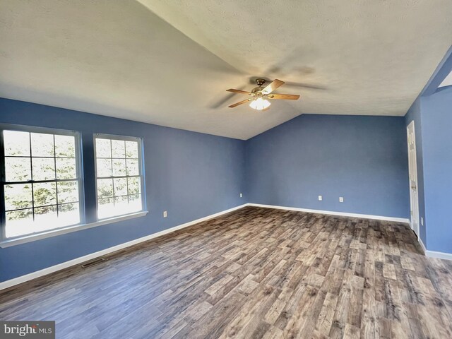 spare room featuring dark hardwood / wood-style floors