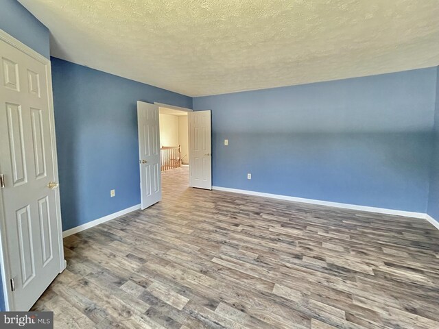 unfurnished bedroom featuring carpet floors and a closet