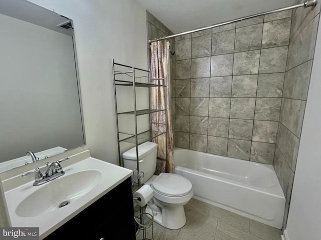 full bath with vanity, toilet, and shower / tub combo with curtain