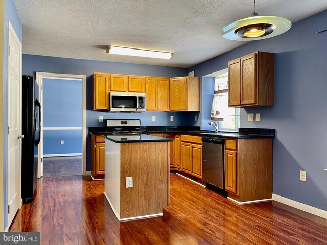 kitchen with ceiling fan, a textured ceiling, dark hardwood / wood-style floors, and black fridge with ice dispenser