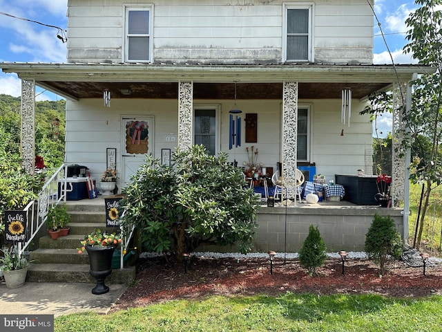 view of front of home featuring covered porch