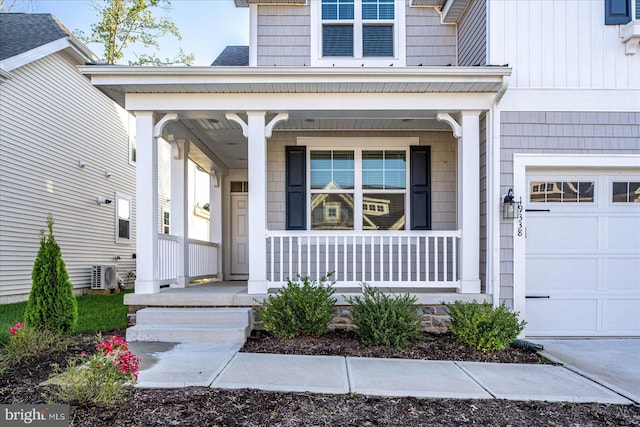 entrance to property with a garage and covered porch